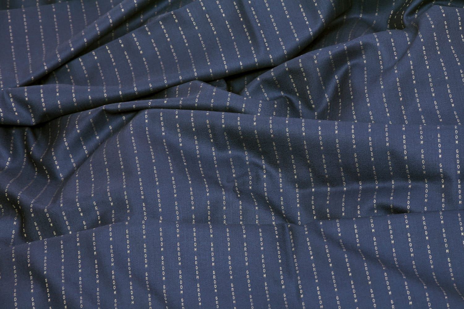 NameWoven bespoke suiting macro detail by House of Bansilal